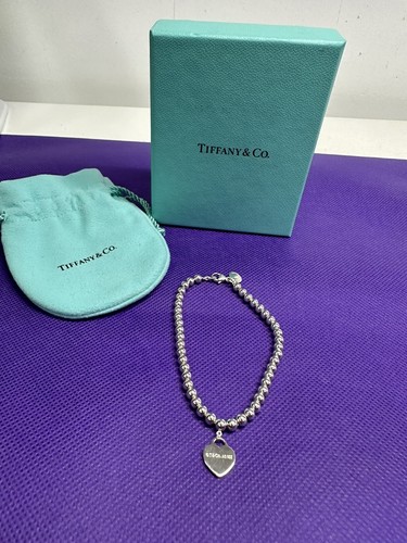 Please return tiffany co - &,