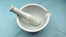 mortier et pilon en porcelaine
