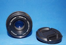 Minolta MD  Rokkor 45 mm f2 pancake, tappi.
