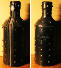 ABSOLUT VODKA limited edition with leather studded zip cover, sealed, as NEW