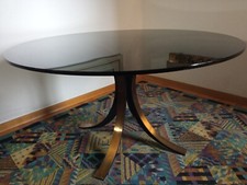 Tavolo Tecno mod. T69 piano in vetro e gambe in metallo di Osvaldo Borsani 1960