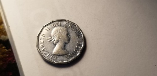1953 near leaf shoulder fold - 1953,