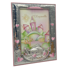 Cornice bimba in argento rosa