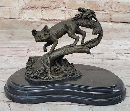 Scultura bronzo un volpe - in,