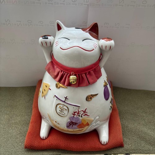 Statua gatto salvadanaio
