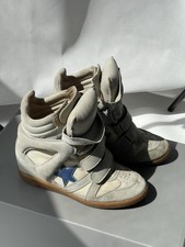 Autentiche sneakers con zeppa