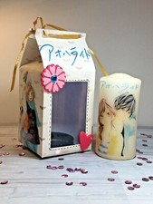 Candela con confezione