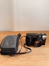 Canon AF35 ML con obiettivo