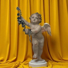 Puttino angelo occhi di vetro