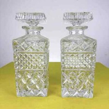 coppia di bottiglie vintage in