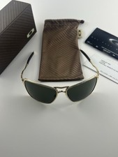 Oakley detenuto oro lucido