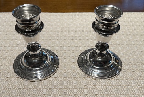 Coppia candelabri pesati - coppia, di