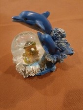 Statuina Con Delfini con Effetto Neve