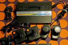 Atari 2600 Junior PAL + 2 Joystick + Paddles + Cavo RF + Alimentatore + 6 Giochi