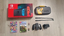 Nintendo Switch con Joy-Con  Rosso e Blu + 6 Giochi + Custodia Di Pikachu 