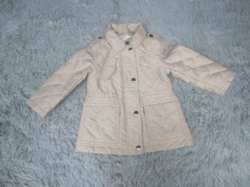 Giacca imbottita beige con zip