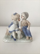 Vintage Boy and Girl Sat on