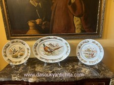 Set di tre piatti da