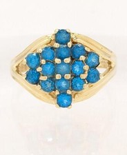 Anello a grappolo in oro