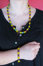 Collana e bracciale radice di rubino e di topazio