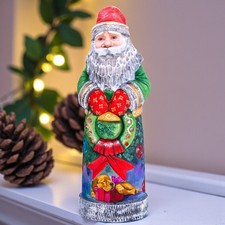 Babbo Natale in legno con cane