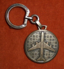 Porte-clés AUGIS  U.A.T. Union Aéromaritime de Transports Aviation DOUGLAS DC-8