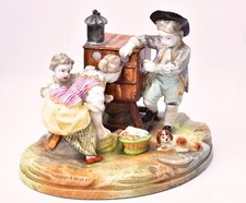 Scultura in porcellana. I bambini e la scatola ottica Jacob PETIT.