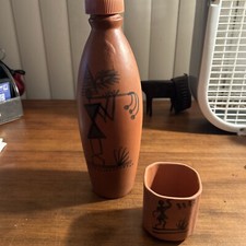 Brocca e tazza acqua in