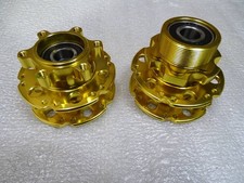 Nuovo set mozzi anteriori e posteriori originali STRIDA in oro