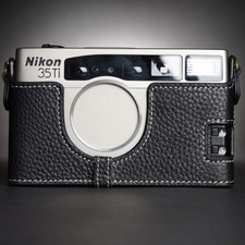 Custodia mezza fotocamera in