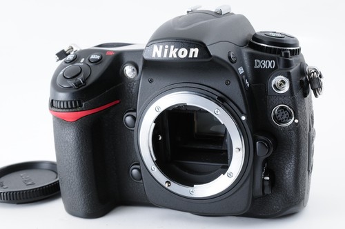 Exc corpo fotocamera - +,