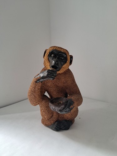 Scimmia che mangia - , statua