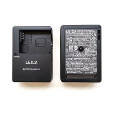 NUOVO Caricabatteria originale