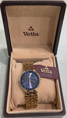 Orologio vetta vintage dorato - vintage,