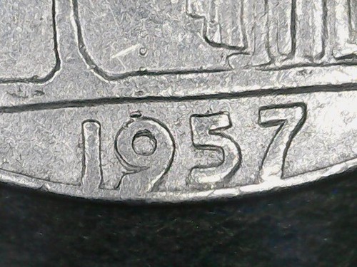 100 lire 1957 - 1957, errore