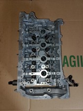 Testata per motore - per,