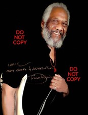 Foto 8x10 autografata bassista