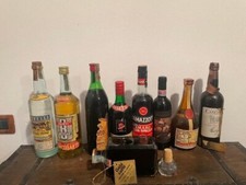 Lotto di 9 vecchie bottiglie vino/liquore ancora sigillate(Entra e osserva foto)