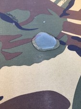 Materiale tessuto mimetico