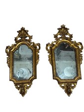 Una splendida coppia di specchi Luigi Filippo in legno dorato