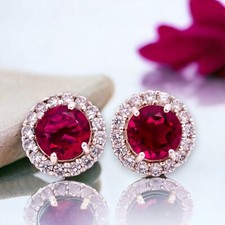 Orecchini rosa con ciondolo in