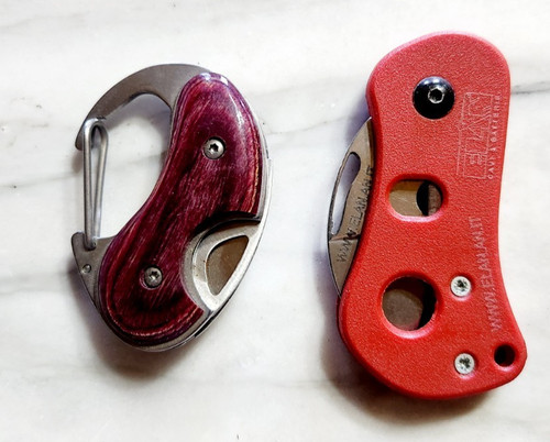 Due coltellini quello rosso e - coltellini,