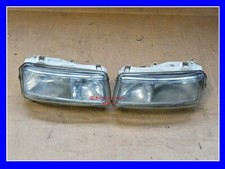 COPPIA FARI ANTERIORI Originali HELLA per VOLKSWAGEN Passat 94-96