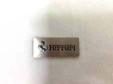 Ferrari emblem with sticker