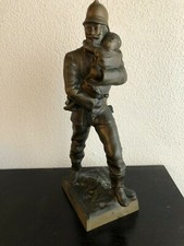 SCULTURA POMPIERE CON BAMBINO