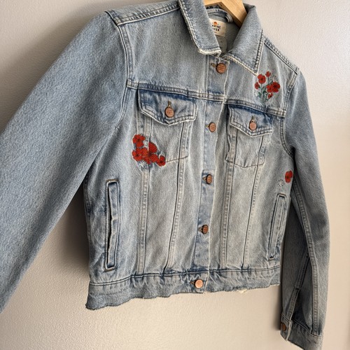 Jeans blu ricamato floreale