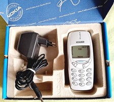 Nokia 3310 perfettamente funzionante con caricabatteria, batteria, scatola d'acq