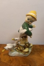 Bambino con papere, ceramica