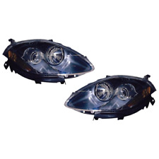 COPPIA FARI FIAT BRAVO II 2007-2009 PARABOLA NERA IND.DIREZ.ARANCIO c/MOT. ELET.