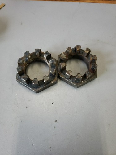 Rear axle nut pair - axle,
